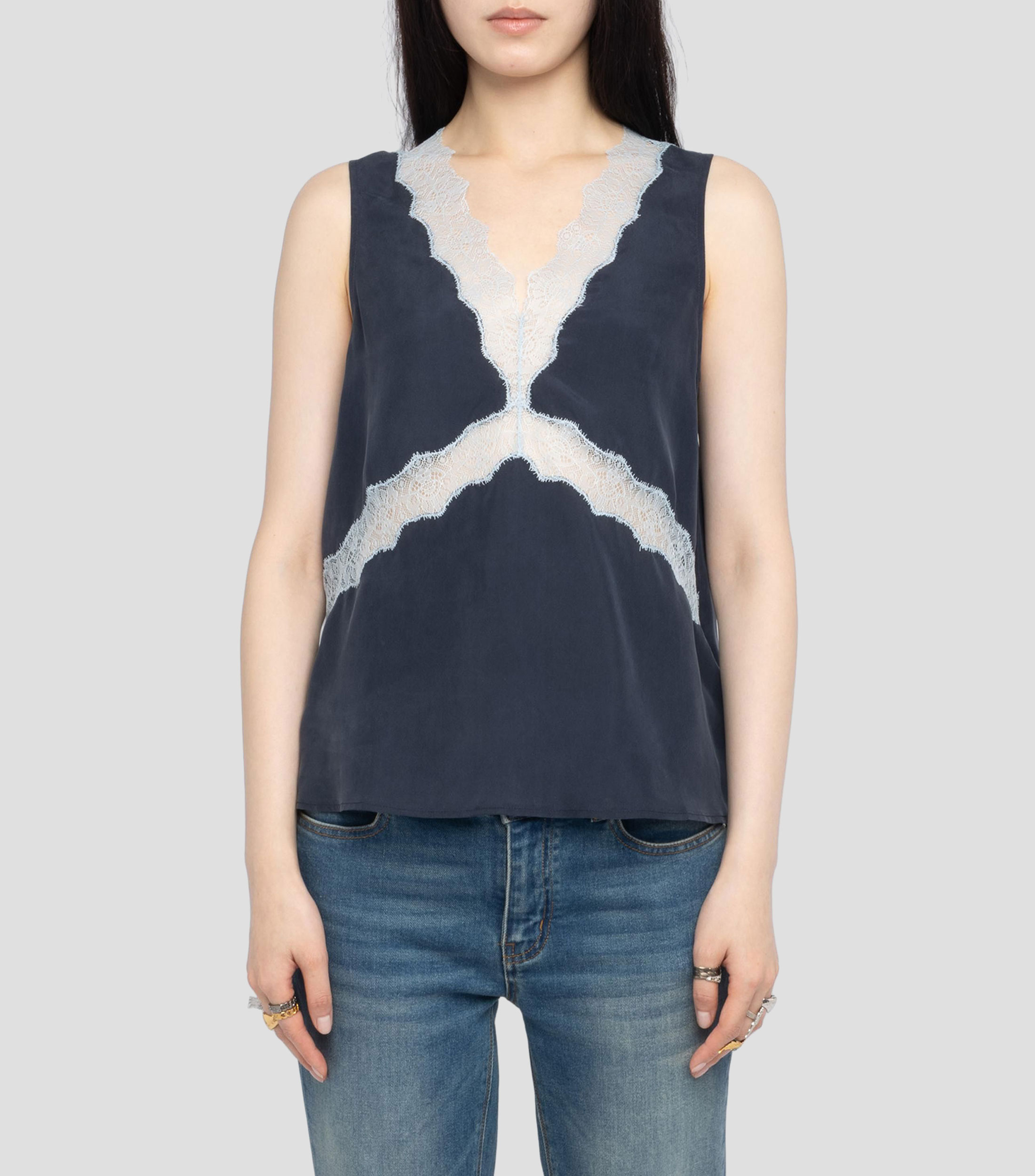 Blusa lisa sin mangas Mujer